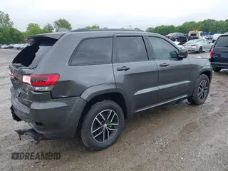 2017 Jeep Grand Cherokee Trailhawk with VIN 1C4RJFLG2HC645209, listed as a IAAI auction lot 42348470 with 170,905 mi miles and . Bid and sale history available at DreamBid. Image 4.