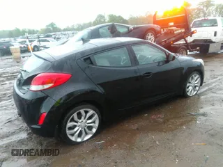 2012 Hyundai Veloster w/Gray Int with VIN KMHTC6AD2CU024382, listed as a IAAI auction lot 41980192 with 46,684 mi miles and . Bid and sale history available at DreamBid. Image 4.