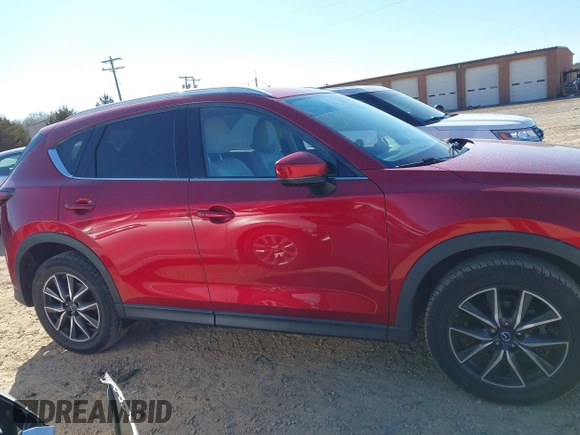 2018 Mazda CX-5 Grand Touring with VIN JM3KFADM3J0380826, listed as a IAAI auction lot 41888097 with 70,529 mi miles. Bid and sale history available at carsss.com. Image 14.