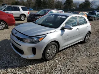 2019 Kia Rio S with VIN 3KPA25AB5KE213967, listed as a Copart auction lot 87100004 with 76,204 mi miles and Salvage Title. Bid and sale history available at DreamBid. Image 1.