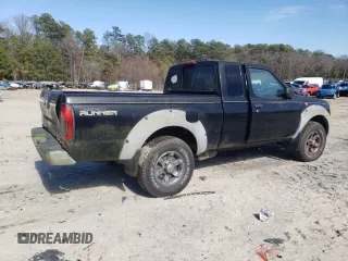 2001 Nissan Frontier SE Desert Runner with VIN 1N6ED26T41C403063, listed as a Copart auction lot 48227135 with 262,014 mi miles and Clean title. Bid and sale history available at DreamBid. Image 3.