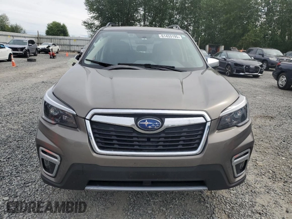 2021 Subaru Forester Touring z VIN JF2SKAXC0MH560263, wystawiony jako Copart lot #61453195 z przebiegiem Nie podano mil oraz Szkoda całkowita • Salvage title. Historia ofert i sprzedaży dostępna na DreamBid. Obrazek 5.