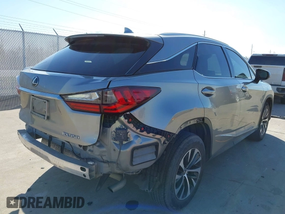 2020 Lexus RX with VIN 2T2AZMAA7LC173478, listed as a IAAI auction lot 41671494 with 91,777 mi miles. Bid and sale history available at carsss.com. Image 17.