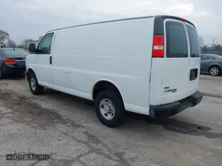 2011 Chevrolet Express Cargo Van with VIN 1GCWGFFA7B1108976, listed as a IAAI auction lot 40937070 with 296,821 mi miles. Bid and sale history available at carsss.com. Image 3.