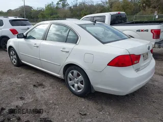 2009 Kia Optima LX z VIN KNAGE228395333286, wystawiony jako IAAI lot #41737577 z przebiegiem 113 152 mil mil oraz . Historia ofert i sprzedaży dostępna na DreamBid. Obrazek 3.