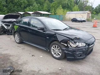 2015 Mitsubishi Lancer ES with VIN JA32U2FU9FU002350, listed as a IAAI auction lot 40054160 with 120,980 mi miles. Bid and sale history available at carsss.com. Image 1.