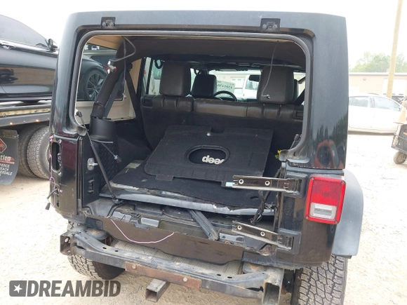 2015 Jeep Wrangler Unlimited Rubicon with VIN 1C4BJWFG7FL688728, listed as a IAAI auction lot 42054304 with 100,152 mi miles and . Bid and sale history available at DreamBid. Image 6.