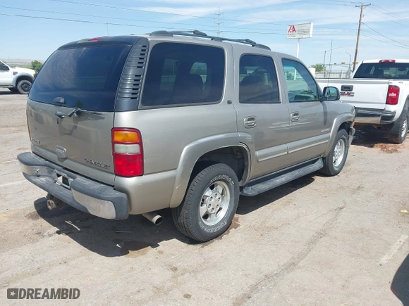 2000 Chevrolet New Tahoe LT with VIN 1GNEK13T7YJ185916, listed as a IAAI auction lot 42109831 with 205,165 mi miles. Bid and sale history available at carsss.com. Image 4.