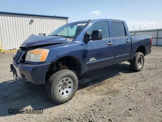 2010 Nissan Titan Pro-4X with VIN 1N6BA0EC7AN304243, listed as a Copart auction lot 65790405 with Not provided miles and Salvage title. Bid and sale history available at DreamBid. Image 1.
