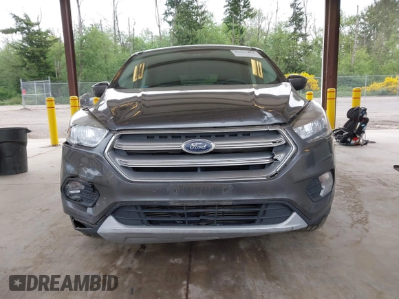 2017 Ford Escape SE z VIN 1FMCU9G93HUC97081, wystawiony jako IAAI lot #42327866 z przebiegiem 97 580 mil mil oraz . Historia ofert i sprzedaży dostępna na DreamBid. Obrazek 12.