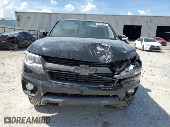 2017 Chevrolet Colorado 4WD Z71 with VIN 1GCGTDEN0H1297990, listed as a Copart auction lot 60800055 with 87,321 mi miles and Salvage title. Bid and sale history available at DreamBid. Image 5.