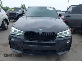 2015 BMW X4 xDrive28i with VIN 5UXXW3C54F0M88740, listed as a IAAI auction lot 42275157 with 159,281 mi miles and . Bid and sale history available at DreamBid. Image 6.