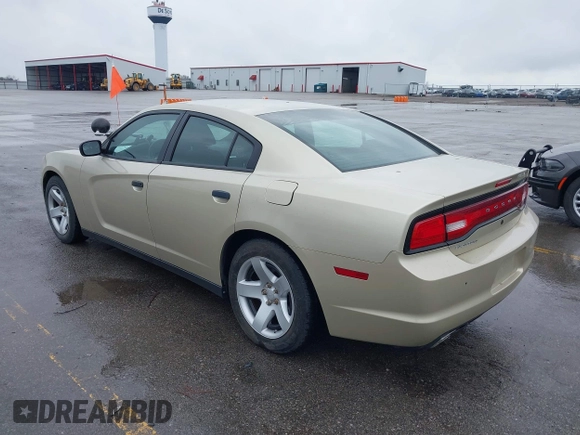 2013 Dodge Charger Police with VIN 2C3CDXAT9DH692946, listed as a IAAI auction lot 42115225 with 107,086 mi miles. Bid and sale history available at carsss.com. Image 3.