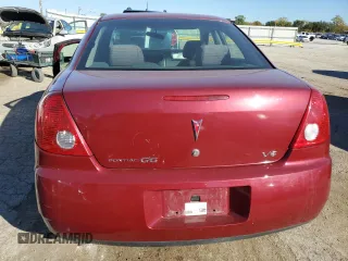 2005 Pontiac G6 with VIN 1G2ZG528054173847, listed as a Copart auction lot 77558494 with 84,527 mi miles and Salvage Title. Bid and sale history available at carsss.com. Image 6.