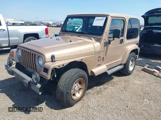 1999 Jeep Wrangler Sahara with VIN 1J4FY49S8XP462512, listed as a IAAI auction lot 42165052 with 146,135 mi miles and . Bid and sale history available at DreamBid. Image 2.