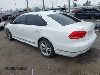 2015 Volkswagen Passat 1.8T SE w/Sunroof & Nav with VIN 1VWBT7A31FC043798, listed as a IAAI auction lot 42108289 with 132,442 mi miles. Bid and sale history available at carsss.com. Image 3.
