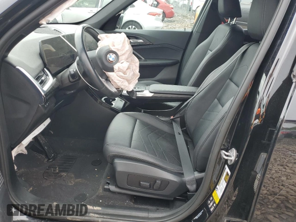 2023 BMW X1 xDrive28i with VIN WBX73EF03P5W45445, listed as a Copart auction lot 58377635 with 47,249 mi miles and Salvage title. Bid and sale history available at DreamBid. Image 7.