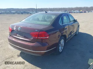 2013 Volkswagen Passat SEL Premium z VIN 1VWCP7A39DC052321, wystawiony jako IAAI lot #41694214 z przebiegiem 151 931 mil mil oraz . Historia ofert i sprzedaży dostępna na DreamBid. Obrazek 4.