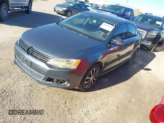 2013 Volkswagen Jetta SE with VIN 3VWDX7AJ1DM411050, listed as a IAAI auction lot 40888860 with 57,938 mi miles and . Bid and sale history available at DreamBid. Image 2.