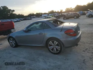 2009 Mercedes-Benz SLK-Class 3.5L with VIN WDBWK58F19F191589, listed as a Copart auction lot 75384764 with 151,445 mi miles and Salvage Title. Bid and sale history available at carsss.com. Image 2.