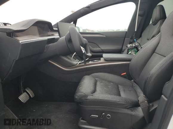 2023 Tesla Model X with VIN 7SAXCAE58PF379943, listed as a Copart auction lot 86352354 with Not Provided miles and Salvage Title. Bid and sale history available at DreamBid. Image 7.