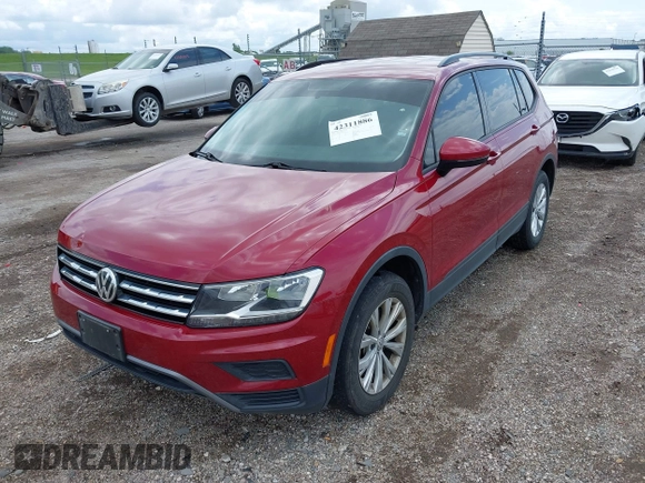 2018 Volkswagen Tiguan S with VIN 3VV1B7AX3JM045193, listed as a IAAI auction lot 42311886 with 69,049 mi miles and . Bid and sale history available at DreamBid. Image 17.