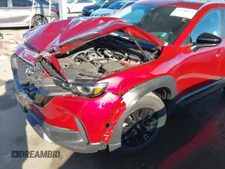 2024 Mazda CX-50 S Premium with VIN 7MMVABDM9RN231524, listed as a IAAI auction lot 41950063 with 1,613 mi miles and . Bid and sale history available at DreamBid. Image 6.