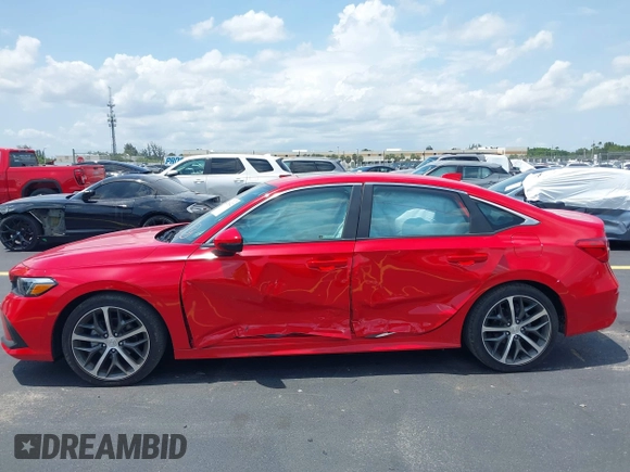 2023 Honda Civic Touring with VIN 2HGFE1F94PH323451, listed as a IAAI auction lot 42383422 with 6,120 mi miles and . Bid and sale history available at DreamBid. Image 6.