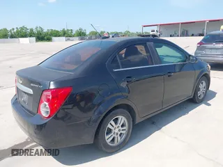 2015 Chevrolet Sonic LT with VIN 1G1JC5SH7F4160978, listed as a IAAI auction lot 42229099 with 211,664 mi miles and . Bid and sale history available at DreamBid. Image 4.