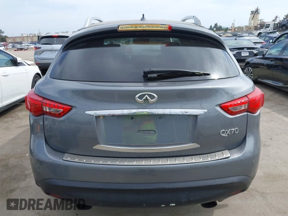 2014 Infiniti QX70 with VIN JN8CS1MU8EM450428, listed as a IAAI auction lot 42233727 with 88,342 mi miles and . Bid and sale history available at DreamBid. Image 16.