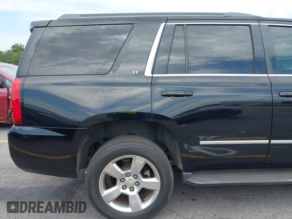 2015 Chevrolet Tahoe LT with VIN 1GNSCBKC4FR145119, listed as a IAAI auction lot 42309931 with 99,408 mi miles and . Bid and sale history available at DreamBid. Image 18.