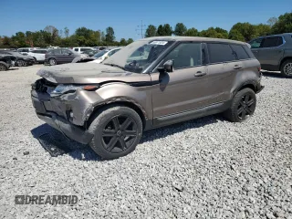 2015 Land Rover Range Rover Evoque Pure Premium z VIN SALVR2BG9FH005735, wystawiony jako Copart lot #69971924 z przebiegiem Nie podano mil oraz Szkoda całkowita • Salvage title. Historia ofert i sprzedaży dostępna na DreamBid. Obrazek 1.