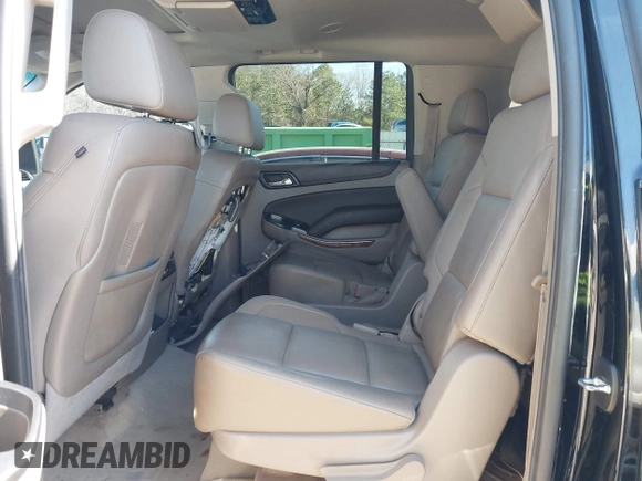 2015 Chevrolet Suburban LTZ with VIN 1GNSCKKC3FR249956, listed as a IAAI auction lot 41306605 with 122,942 mi miles and . Bid and sale history available at DreamBid. Image 8.
