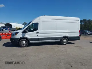 2022 Ford Transit Cargo with VIN 1FTBW3X80NKA69156, listed as a IAAI auction lot 42059236 with 100,096 mi miles and . Bid and sale history available at DreamBid. Image 14.