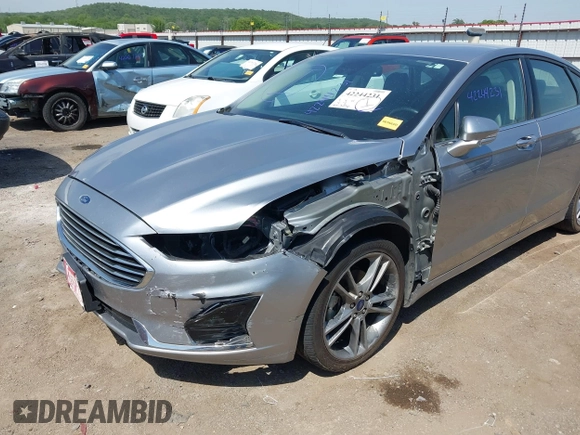2020 Ford Fusion SEL with VIN 3FA6P0CDXLR196124, listed as a IAAI auction lot 42244231 with 99,306 mi miles and . Bid and sale history available at DreamBid. Image 6.