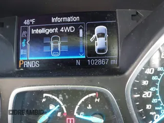 2013 Ford Escape SEL with VIN 1FMCU9H9XDUA81463, listed as a IAAI auction lot 41991257 with 102,867 mi miles and . Bid and sale history available at DreamBid. Image 7.