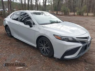 2023 Toyota Camry SE with VIN 4T1G11AKXPU083663, listed as a IAAI auction lot 41245913 with 82,243 mi miles. Bid and sale history available at carsss.com. Image 1.