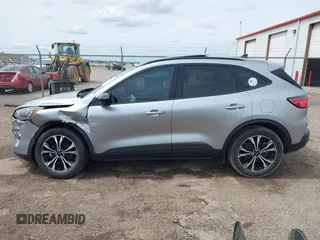 2021 Ford Escape SE Hybrid with VIN 1FMCU0BZ0MUB14085, listed as a IAAI auction lot 41942529 with 34,889 mi miles and . Bid and sale history available at DreamBid. Image 14.