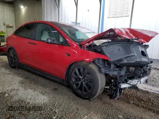 2023 Tesla Model X with VIN 7SAXCBE52PF365140, listed as a Copart auction lot 44564965 with 27,107 mi miles and Salvage Title. Bid and sale history available at DreamBid. Image 4.