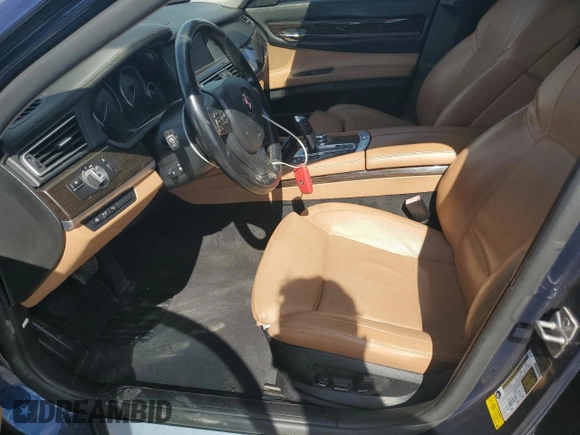 2012 BMW 7 Series with VIN WBAKX6C58CC197207, listed as a Copart auction lot 84153784 with 130,049 mi miles and Salvage title. Bid and sale history available at DreamBid. Image 7.