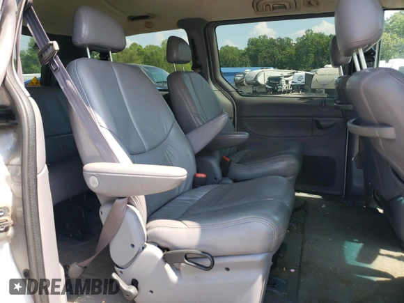 2000 Chrysler Town & Country LXi with VIN 1C4GP54L2YB534385, listed as a Copart auction lot 69637894 with 166,632 mi miles and Salvage Title. Bid and sale history available at carsss.com. Image 11.