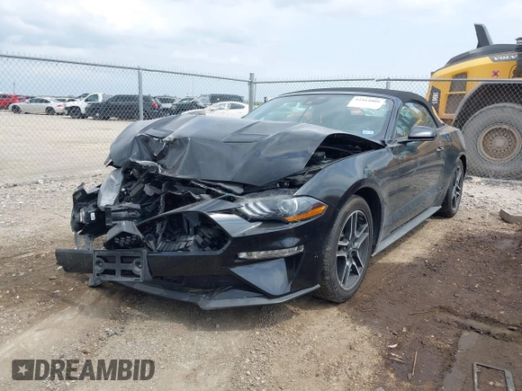 2021 Ford Mustang EcoBoost z VIN 1FATP8UH2M5120226, wystawiony jako IAAI lot #42164009 z przebiegiem 85 571 mil mil oraz . Historia ofert i sprzedaży dostępna na DreamBid. Obrazek 2.