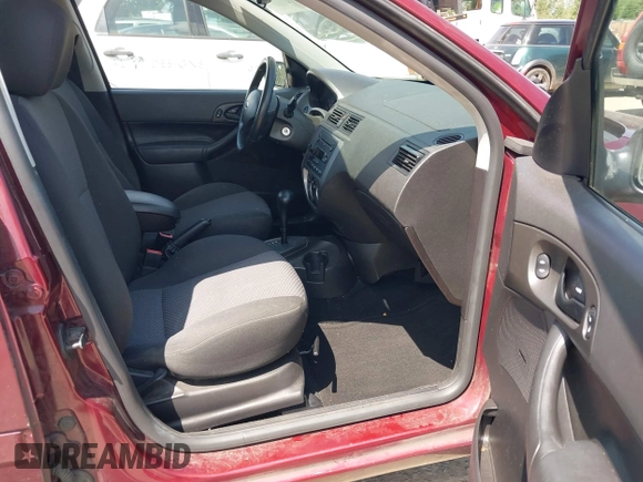 2007 Ford Focus S z VIN 1FAFP37N27W177462, wystawiony jako IAAI lot #42465629 z przebiegiem 169 895 mil mil oraz . Historia ofert i sprzedaży dostępna na DreamBid. Obrazek 5.