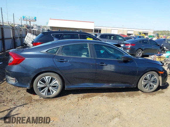 2016 Honda Civic Sedan EX-T with VIN 19XFC1F30GE025233, listed as a IAAI auction lot 41987604 with 129,311 mi miles. Bid and sale history available at carsss.com. Image 13.