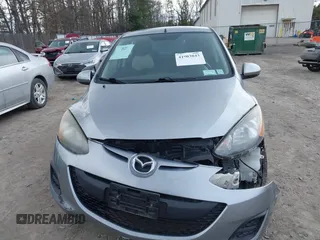 2013 Mazda Mazda2 Sport with VIN JM1DE1KY5D0159551, listed as a IAAI auction lot 41903043 with 107,858 mi miles. Bid and sale history available at carsss.com. Image 6.