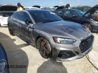2022 Audi RS 5 Sportback z VIN WUAAWCF57NA901250, wystawiony jako Copart lot #77305584 z przebiegiem Nie podano mil oraz Nie do naprawy. Historia ofert i sprzedaży dostępna na DreamBid. Obrazek 4.