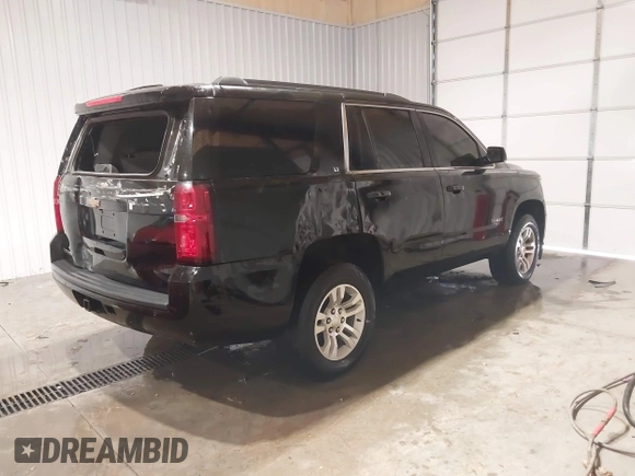 2017 Chevrolet Tahoe LT with VIN 1GNSKBKC6HR299126, listed as a IAAI auction lot 41300644 with 124,821 mi miles and . Bid and sale history available at DreamBid. Image 4.