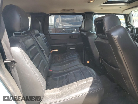2007 Hummer H2 SUV z VIN 5GRGN23UX7H101776, wystawiony jako Copart lot #56337975 z przebiegiem 176 599 mil mil oraz Szkoda całkowita • Salvage title. Historia ofert i sprzedaży dostępna na DreamBid. Obrazek 11.