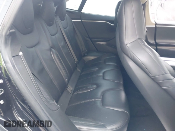 2015 Tesla Model S 85D with VIN 5YJSA1E24FF111120, listed as a IAAI auction lot 41471698 with 58,126 mi miles. Bid and sale history available at carsss.com. Image 8.