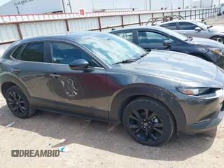 2024 Mazda CX-30 S Select Sport z VIN 3MVDMBBM5RM626265, wystawiony jako IAAI lot #42220770 z przebiegiem 17 895 mil mil oraz . Historia ofert i sprzedaży dostępna na DreamBid. Obrazek 14.